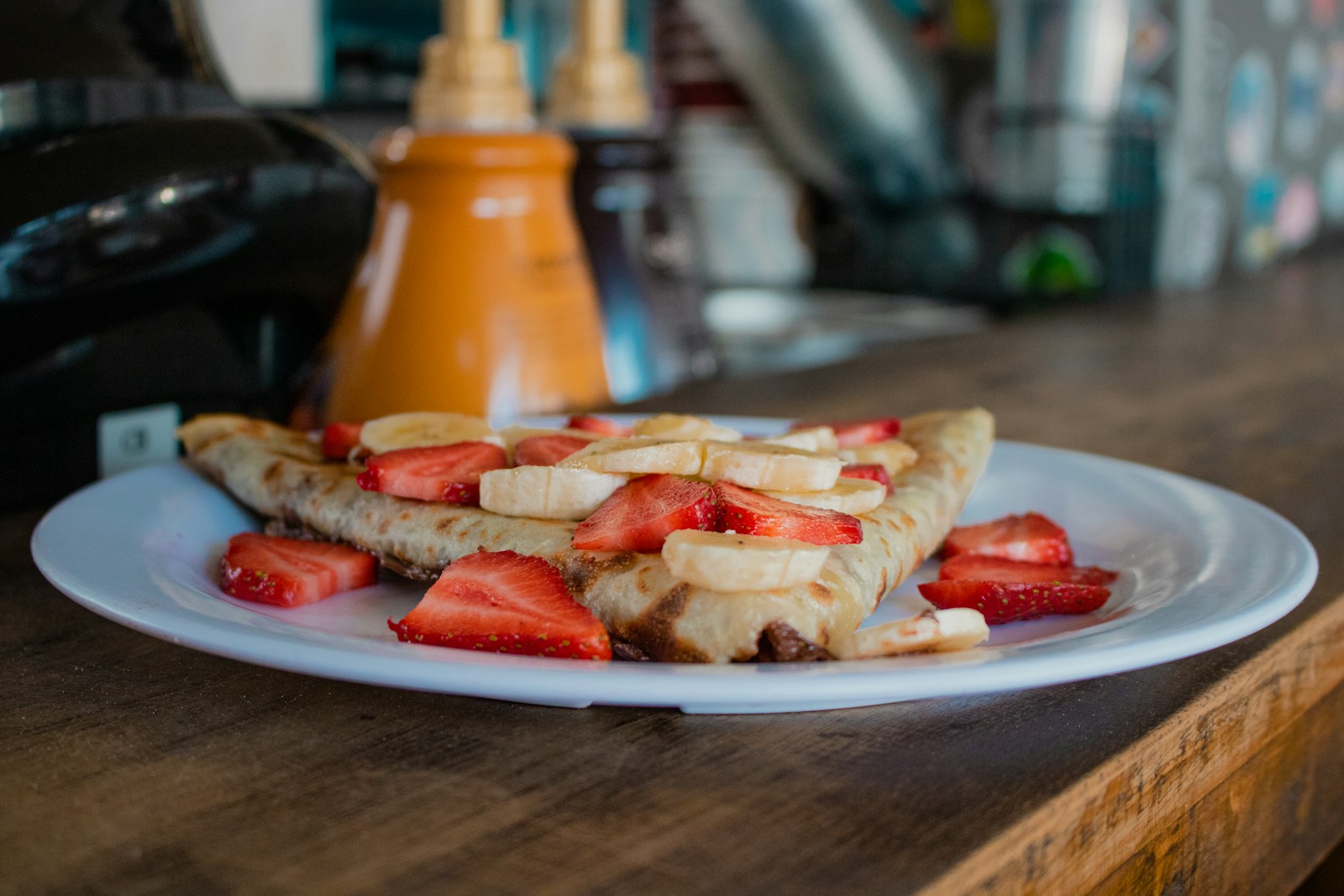 sliced tomato on white ceramic plate